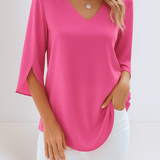 Stylish top with a V-neck and open sleeves