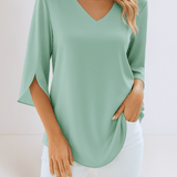 Stylish top with a V-neck and open sleeves